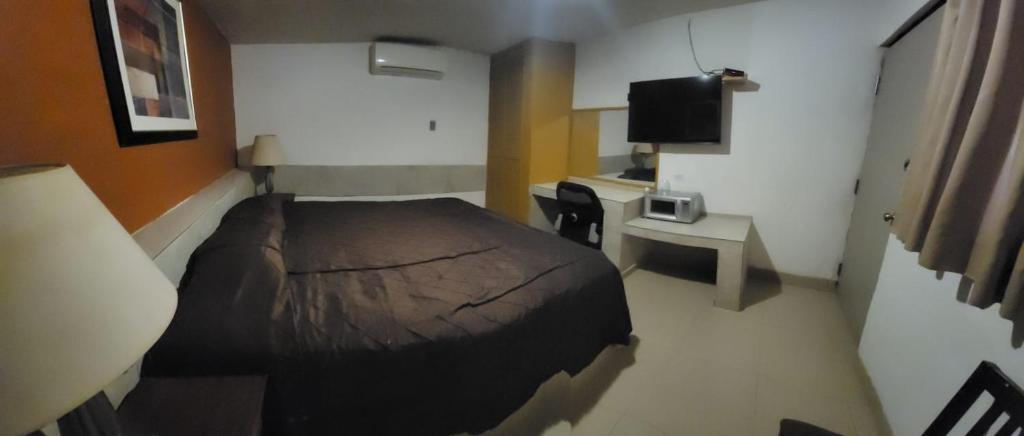 Vista alterna Habitacion Deluxe con cama extragrande
